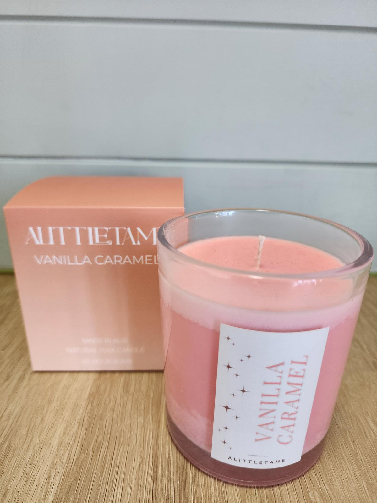 A LITTLE TAME SCENTED CANDLE