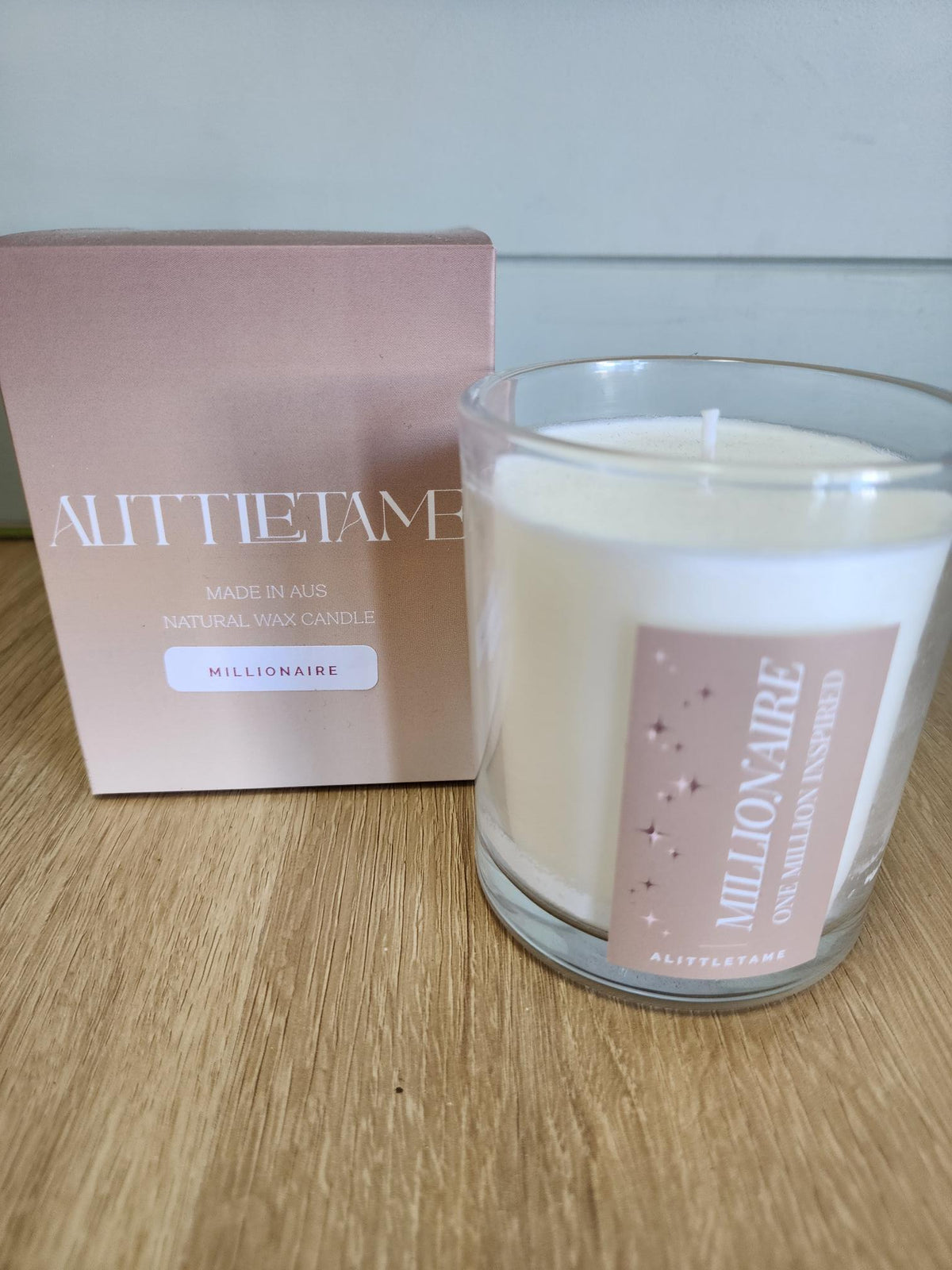 A LITTLE TAME SCENTED CANDLE