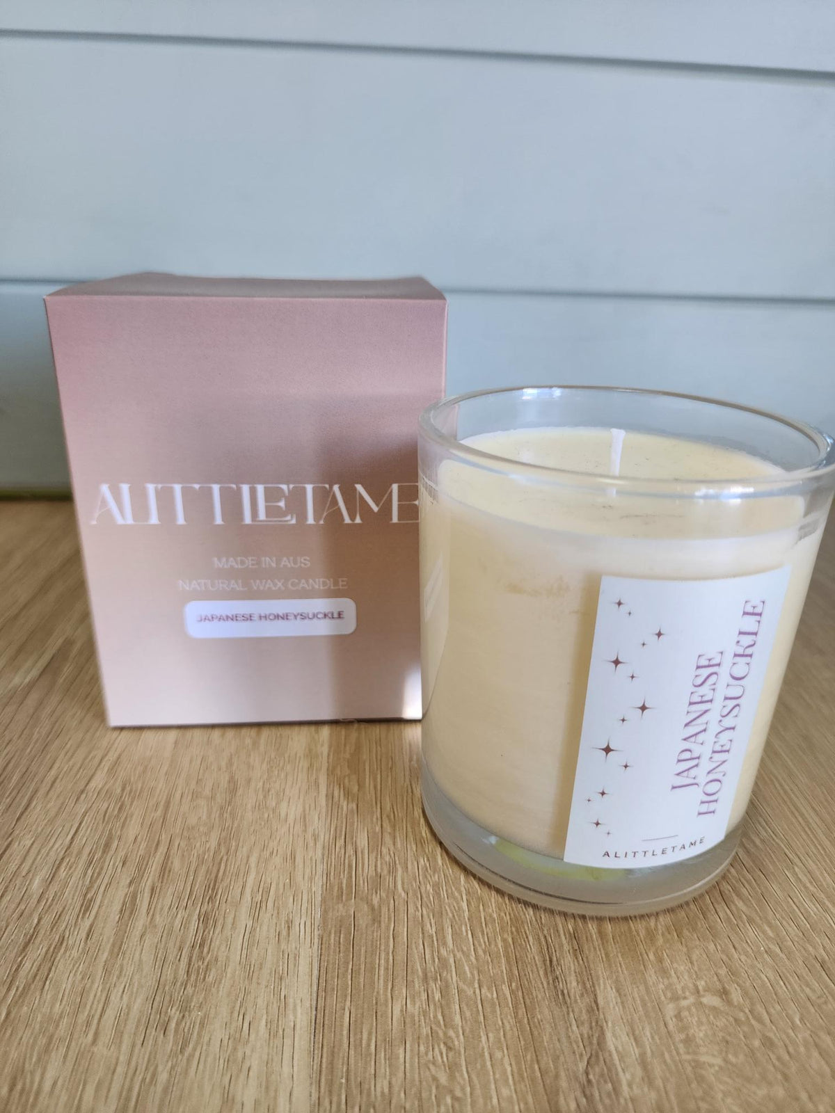 A LITTLE TAME SCENTED CANDLE