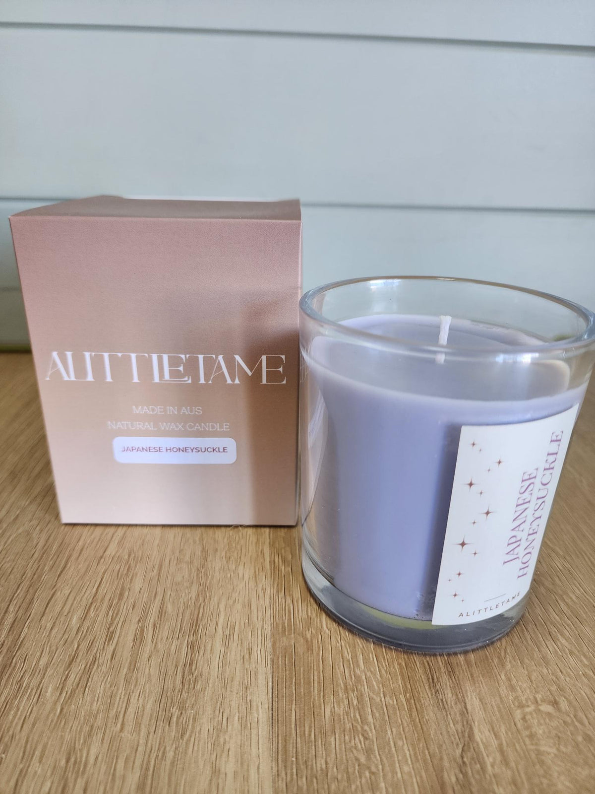 A LITTLE TAME SCENTED CANDLE